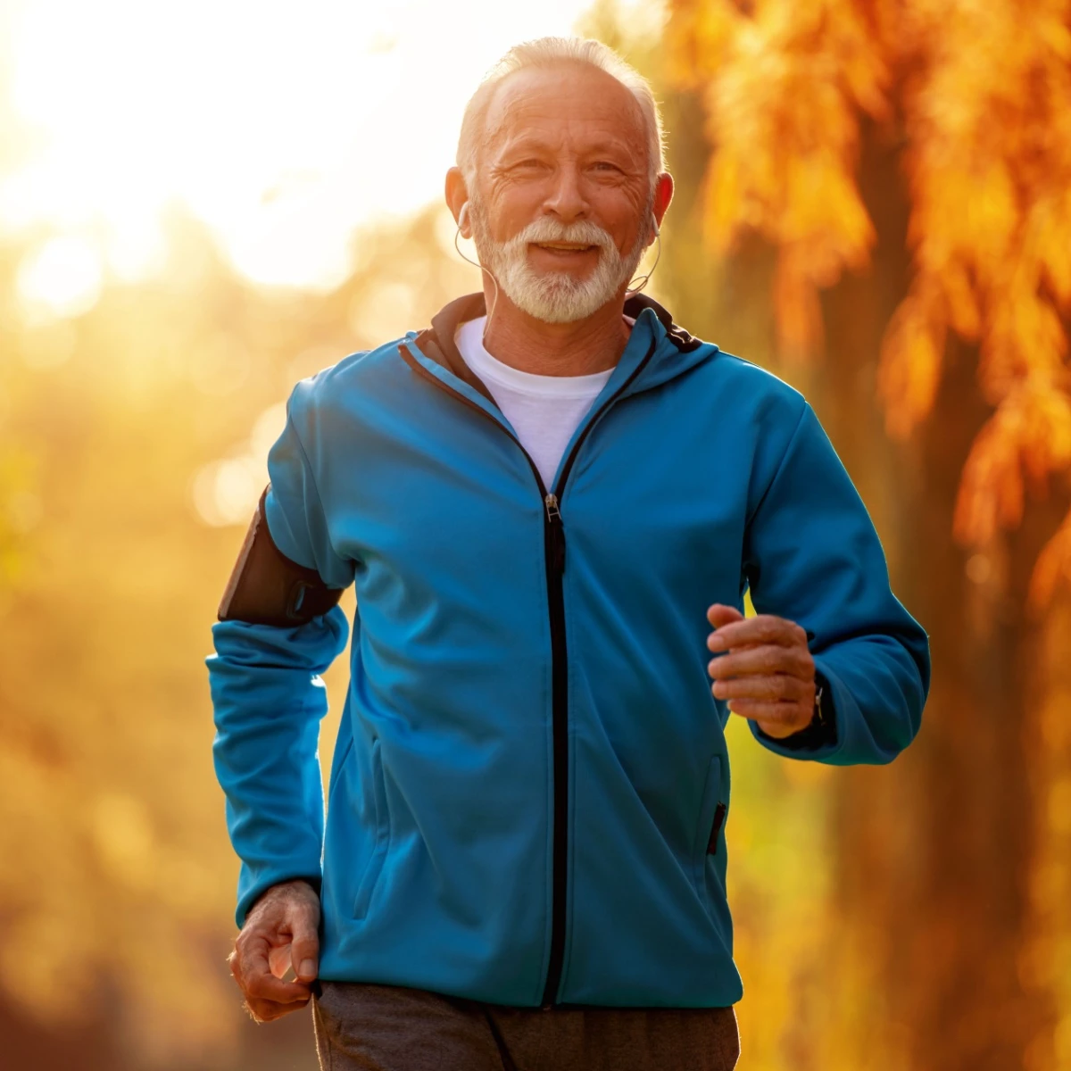 senior man running in a park